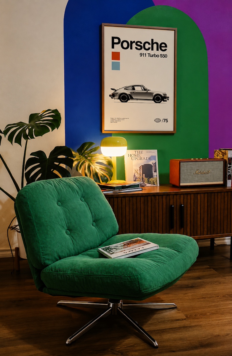 Green lounge chair with colorful walls and eclectic interior decor